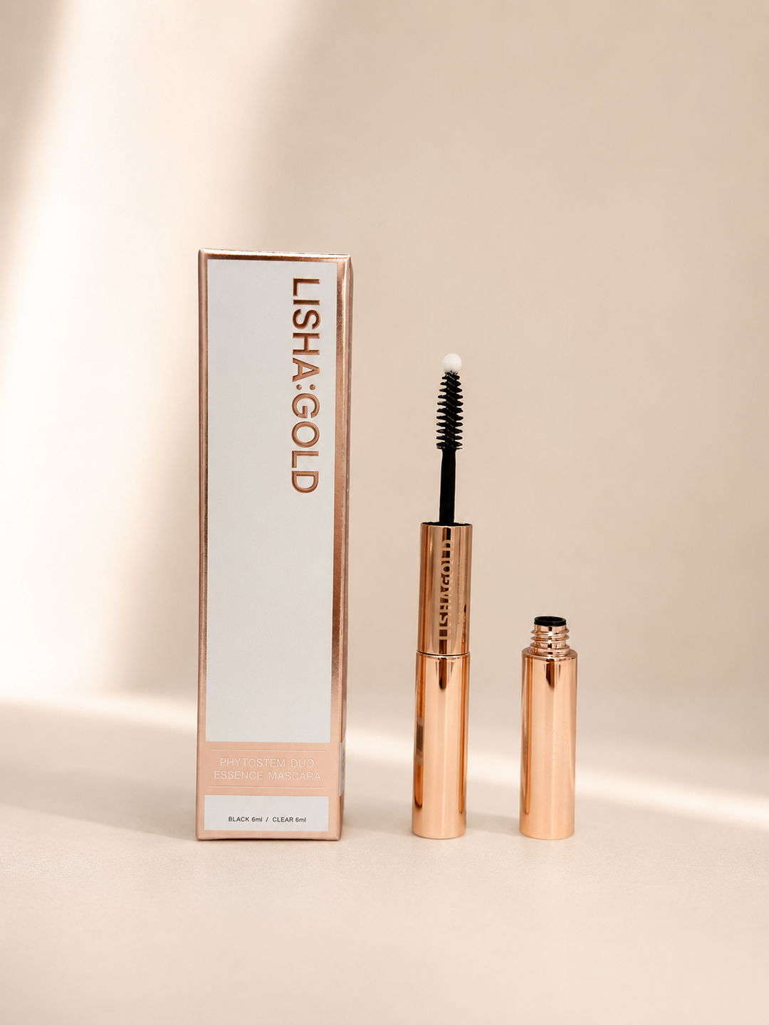 Lisha:Gold Phytostem Duo Essence Mascara — luxury rose gold tube with plant stem cell lash growth treatment and buildable black volume mascara